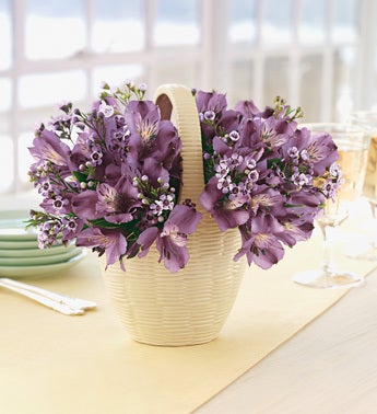 lavender alstroemeria in cermaic woven basket