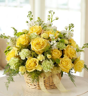 roses, asters, carnations, waxflower in basket