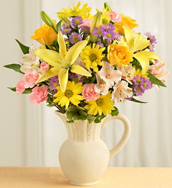 Gorgeous mixed bouqet in pitcher